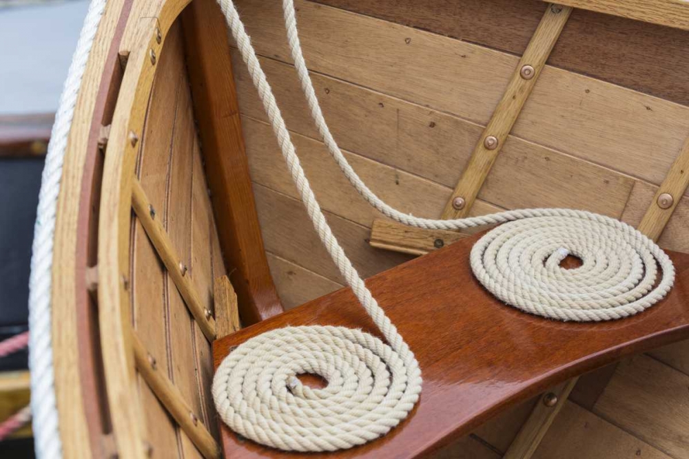 WA, Bainbridge Island, Coiled line in wooden boat